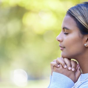Prayer, peace and worship with woman in nature and mockup for God, spirituality and religion faith.